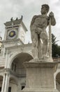 Caco statue and clock tower Royalty Free Stock Photo