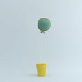 Cactus balloon in Yellow flower pot on pastel blue background. Royalty Free Stock Photo