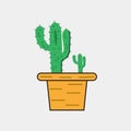 A cactus in a pot with a wooden top.