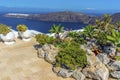 A cactus rockery garden in Imerovigli, Santorini in front of the Caldera view towards Oia Royalty Free Stock Photo