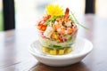 cactus salad with grilled shrimp on top for a seafood variant in a clear dish Royalty Free Stock Photo