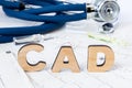 CAD Acronym or abbreviation to medical concept or diagnosis of coronary artery disease - common type of heart disease. Word CAD le Royalty Free Stock Photo