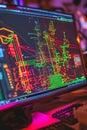 CAD software open on a computer illustrating an electrical power grid with color-coded circuits and pathways.