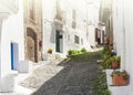 Cadaques, costa brava, spain- narrow streets with white walls on sunlight Royalty Free Stock Photo