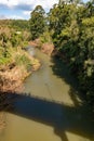 Cadeia river with bridge shadow and forest around Royalty Free Stock Photo