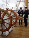 Cadets talking on board of sailing ship