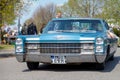 Cadillac Coupe de Ville drives on street