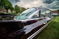 Cadillac Fleetwood, rear view of the classic American road cruiser from 1959 with large tail fins in Lehnin, Germany, August 21, Royalty Free Stock Photo