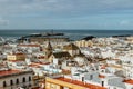 Cadiz, Andalusia, Spain. Aerial panoramic view from Tavira tower of old city with narrow winding alleys, rooftops and seashore on