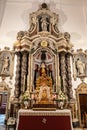 Cadiz, Spain - June 16, 2021: Main altar and altarpiece of the convent of Our Lady of the Rosary and Saint Dominic of CÃÂ¡diz with