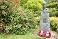 The memorial to Lieutenant Colonel Tommy Harris in The British Garden at The MÃ©morial de Caen Museum.