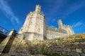 Caernarfon Castle,low angle view of sea wall and steps,from banks of the River Seiont at low tide,Wales,United Kingdom Royalty Free Stock Photo