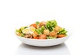 Caesar salad with chicken, croutons and parmesan in a plate isolated on a white background Royalty Free Stock Photo