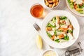 Caesar salad with the classic sauce and wine Royalty Free Stock Photo