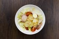 Caesar salad delicious healthy food tomatoes croutons Parmesan cheese and fresh mozzarella on wood background Royalty Free Stock Photo