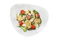 Caesar salad with grilled chicken, croutons, quail eggs and cherry tomatoes. Isolated on white background. Top view. Royalty Free Stock Photo