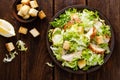 Caesar salad with grilled chicken meat, fresh lettuce, parmesan cheese and fried croutons. Classic North American cuisine