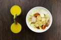 Caesar salad orange juice delicious healthy food tomatoes croutons Parmesan cheese and fresh mozzarella on wood background Royalty Free Stock Photo