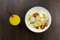 Caesar salad orange juice delicious healthy food tomatoes croutons Parmesan cheese and fresh mozzarella on wood background Royalty Free Stock Photo