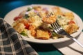 Caesar salad with shrimps on a white plate Royalty Free Stock Photo