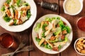 Caesar salad, top shot with wine, pepper, and the classic sauce Royalty Free Stock Photo