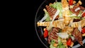 Caesar salad with crispy bacon, grilled chicken, and Parmesan cheese Royalty Free Stock Photo