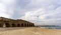 Caesarea, Israel - April 1, 2018: Ancient Roman ruins of aqueduct in Ceasarea Israel historical monument.