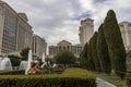 Caesars Palace Hotel, Casino and resort along the Las Vegas strip with tall lush green trees, water fountains, statues, blue sky Royalty Free Stock Photo