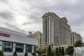 Caesars Palace Hotel, Casino and resort along the Las Vegas strip with tall lush green trees, water fountains, statues, blue sky Royalty Free Stock Photo