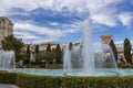 Caesars Palace Hotel, Casino and resort along the Las Vegas strip with tall lush green trees, water fountains, statues, blue sky Royalty Free Stock Photo