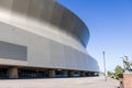 The Caesars Superdome with lush green trees in New Orleans Louisiana Royalty Free Stock Photo