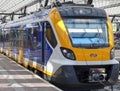 Caf Civity SNG local springer commuter train along platform of Rotterdam Central Station