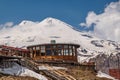 Cafe AI on mount Cheget. In the background, mount Elbrus. Royalty Free Stock Photo