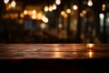 Cafe ambiance wooden table on a backdrop of golden bokeh