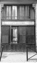 Cafe cardinal at Bordeaux in the street , monochrome wood Windows old