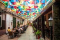 Cafe with colorful umbrellas on a street Royalty Free Stock Photo