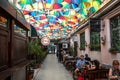 Cafe with colorful umbrellas on a street Royalty Free Stock Photo