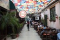 Cafe with colorful umbrellas on a street Royalty Free Stock Photo