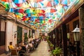 Cafe with colorful umbrellas on a street Royalty Free Stock Photo