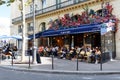 The Cafe de l'Eglise is located in the centre of the 10th arrondissement of Paris. A terrace offers a breathtaking Royalty Free Stock Photo