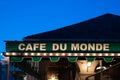 Cafe Du Monde Restaurant Sign at Night in the French Quarter of New Orleans Royalty Free Stock Photo