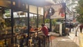 Cafe exterior near sarinah streets jakarta during the evening