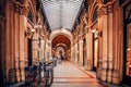 Cafe inside old arcade Ferstel Passage in Vienna  with columns and glass roof. Royalty Free Stock Photo