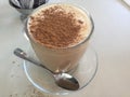 Latte. Coffee. Cinnamon powder. Royalty Free Stock Photo