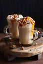 Cafe latte with whipped cream and caramel