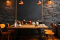 A cafe mockup showcasing a blank chalkboard menu on the wall Royalty Free Stock Photo