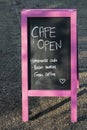 Cafe Open Sign on a Blackboard Easel, Homemade Cake, Bacon Butties,