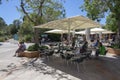 Cafe with people outside the caves