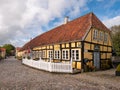 Cafe Postkassen in half-timbered old post office along cobbled street in Mariager, Nordjylland, Denmark