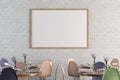 Cafe or restaurant intrerior with blank horizontal poster on the white brick wall. Royalty Free Stock Photo